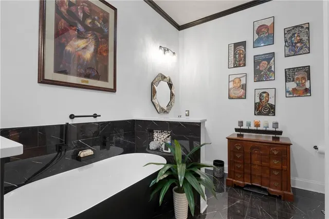 a lobby with furniture and wooden floor