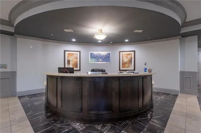 a view of a building with potted plants