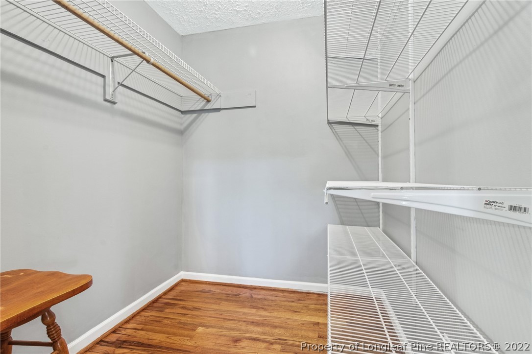 5457 Sambo Jackson Road Godwin, NC 28344 - Photo 16 of 33 a view of a room with racks on the wall