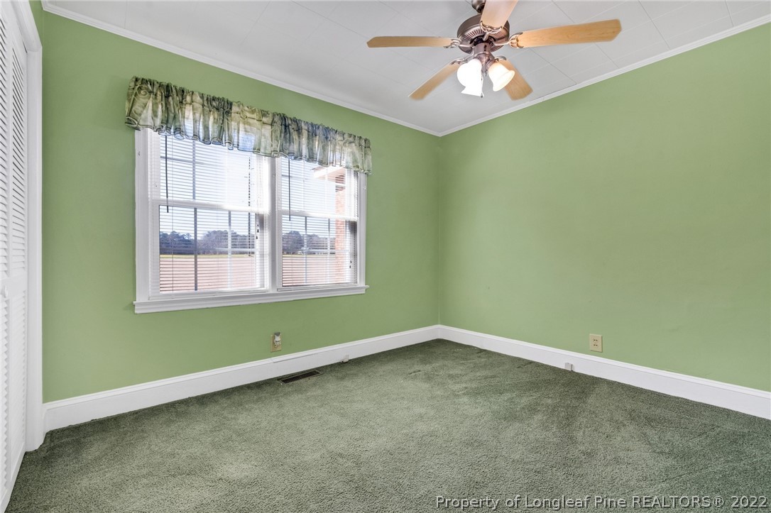 5457 Sambo Jackson Road Godwin, NC 28344 - Photo 17 of 33 a view of an empty room with a window