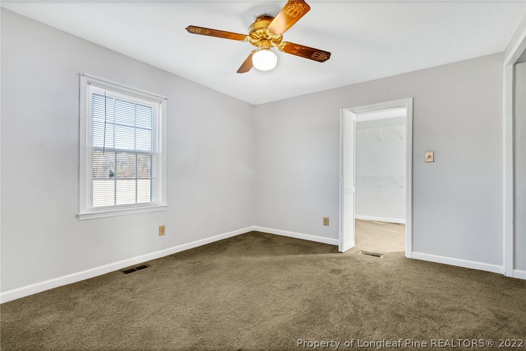 5457 Sambo Jackson Road Godwin, NC 28344 - Photo 21 of 33 a view of an empty room with a window
