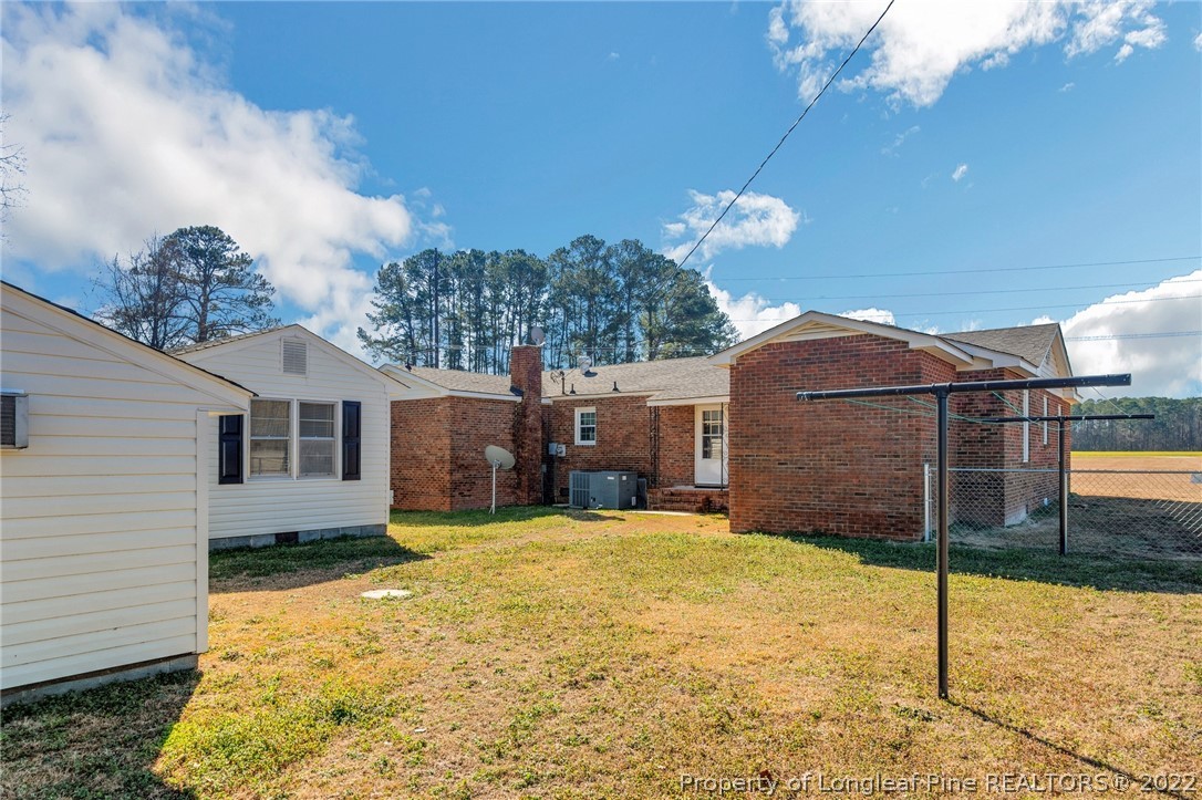 5457 Sambo Jackson Road Godwin, NC 28344 - Photo 3 of 33 a view of a house with a yard
