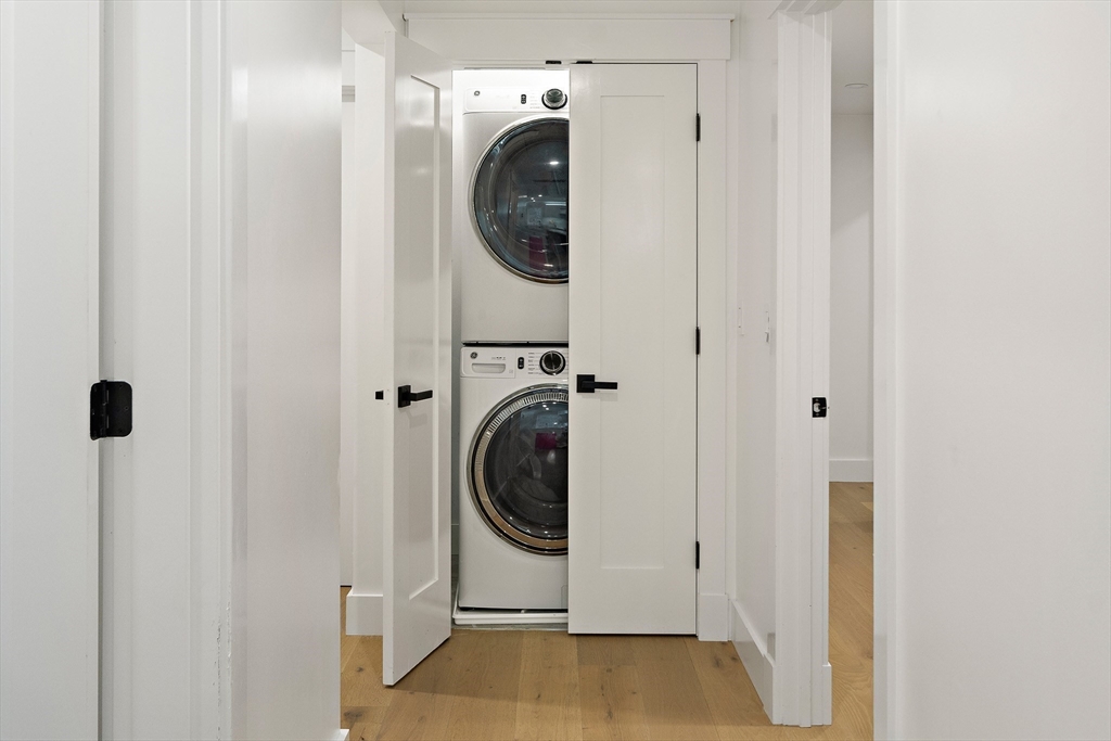 355 Maynard Road Sudbury, MA 01776 - Photo 10 of 18 a utility room with dryer and washer