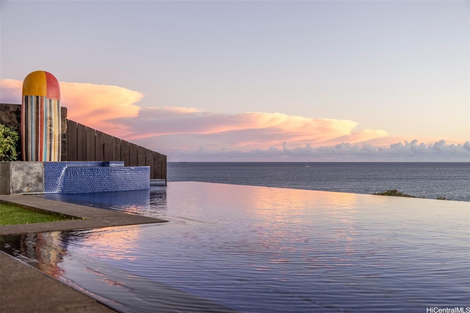 4125 Black Point Road Honolulu, HI 96816 - Photo 2 of 25 a view of swimming pool with seating space and hardwood floor