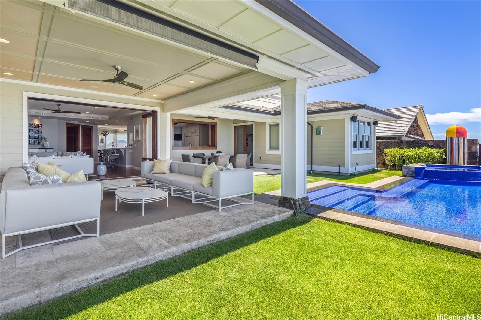 4125 Black Point Road Honolulu, HI 96816 - Photo 5 of 25 a view of a house with swimming pool and porch