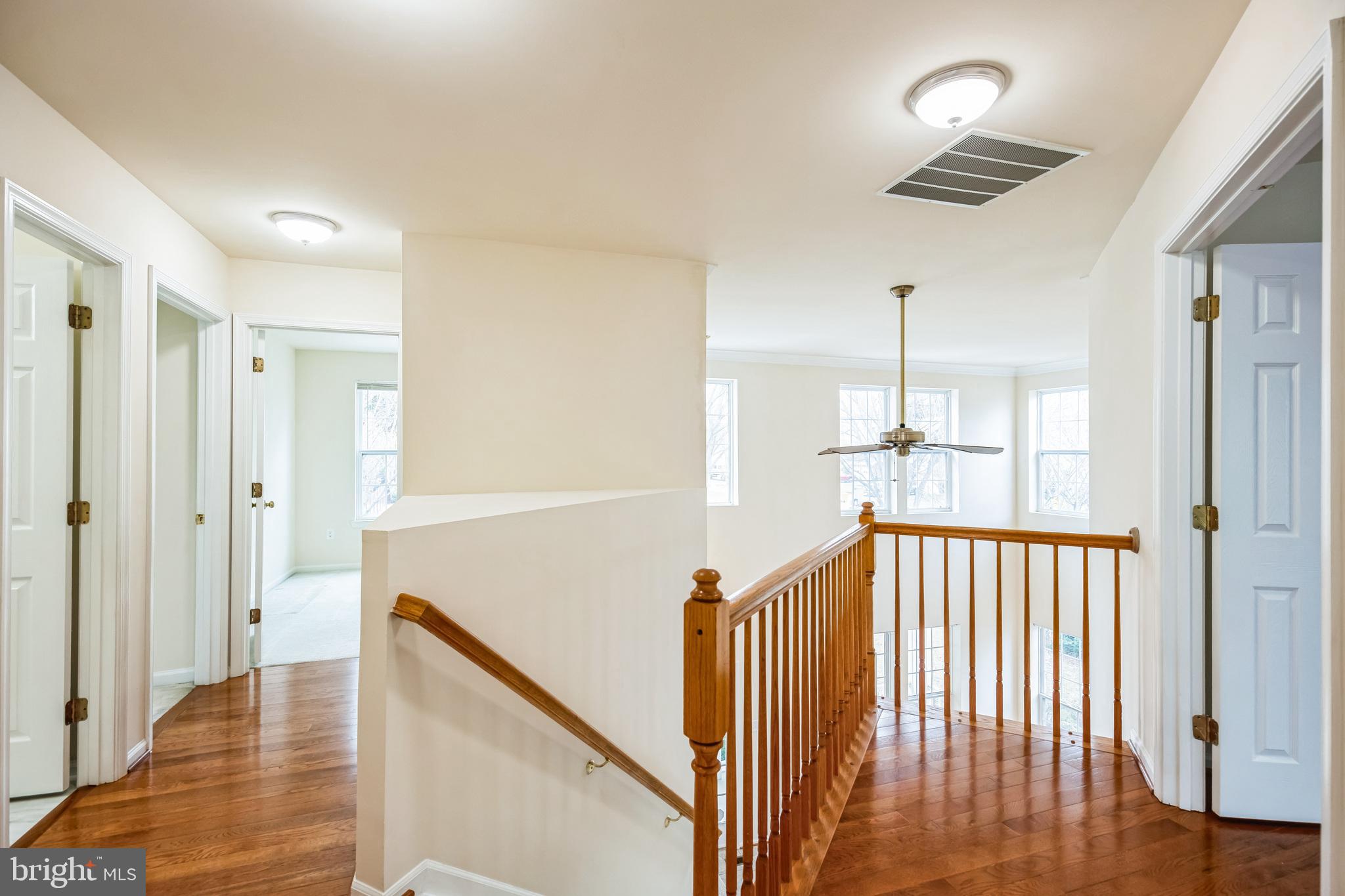 1557 Chapman Road Crofton, MD 21114 - Photo 16 of 39 Open upstairs hallway.