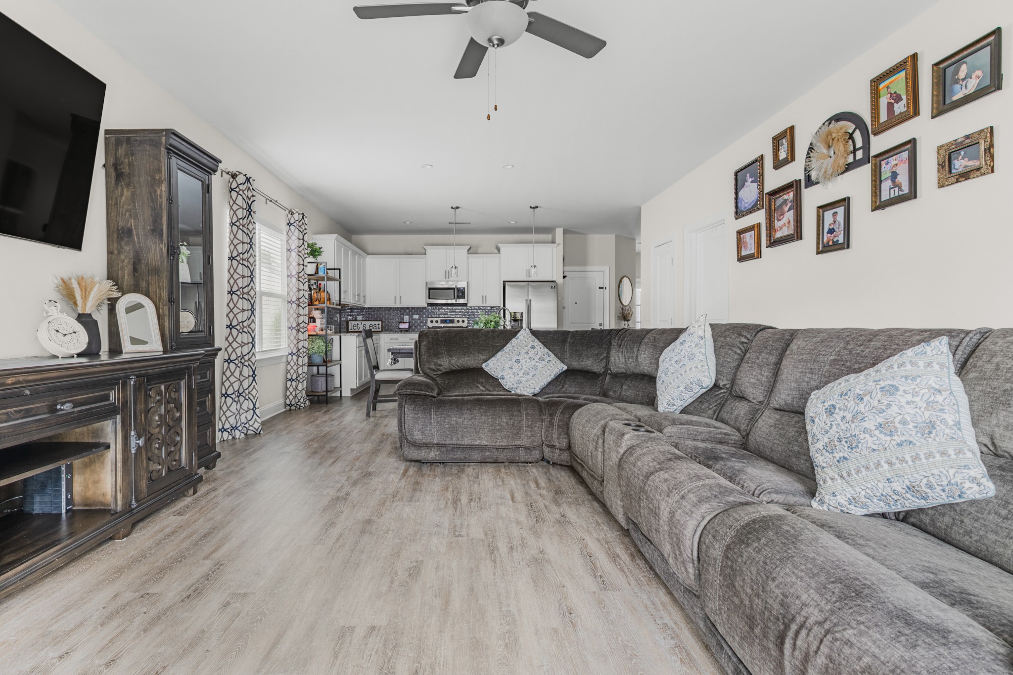 404 Golf Club Lane Springfield, TN 37172 - Photo 11 of 38 a living room with furniture and a flat screen tv