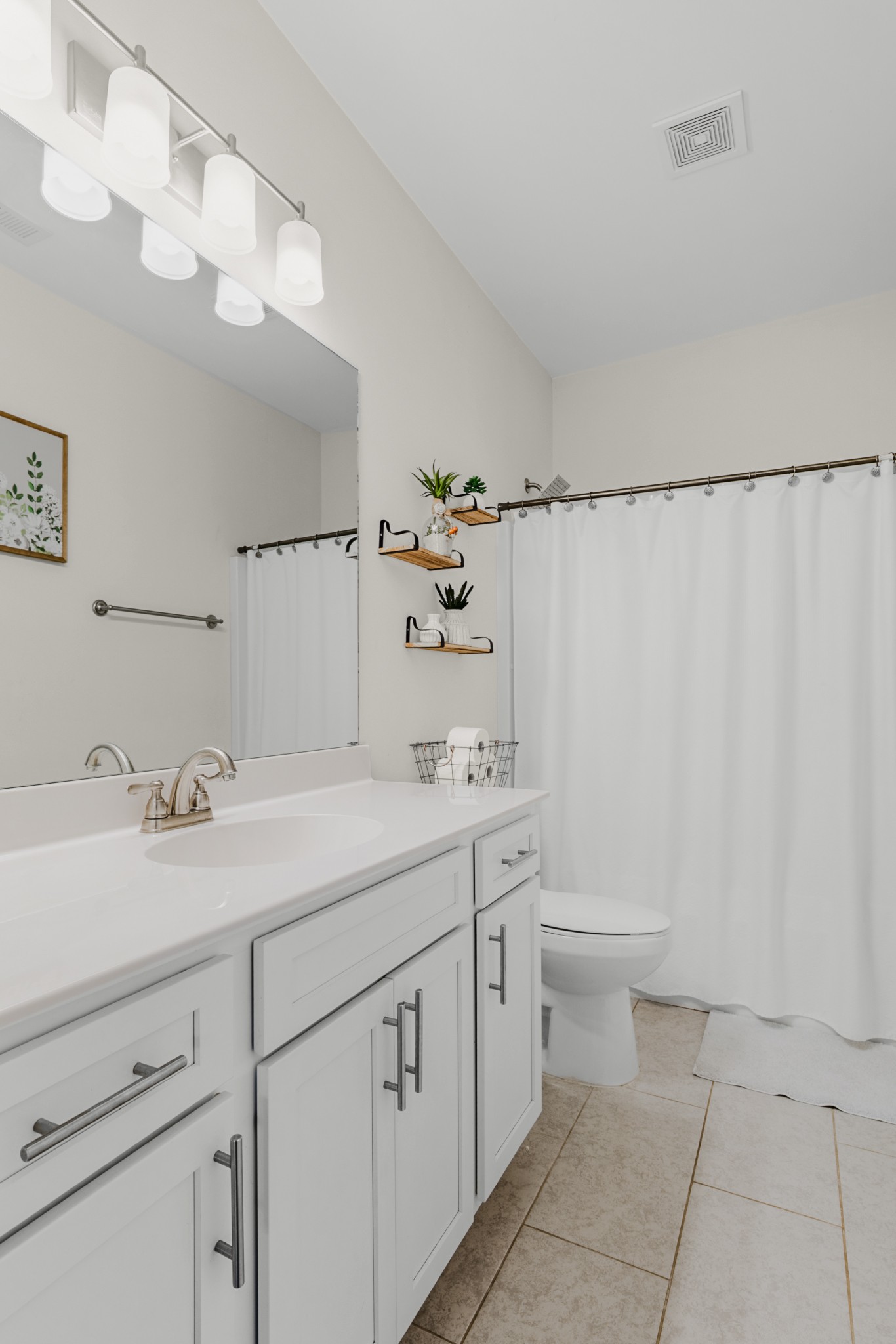 404 Golf Club Lane Springfield, TN 37172 - Photo 27 of 38 a bathroom with a sink a toilet and vanity