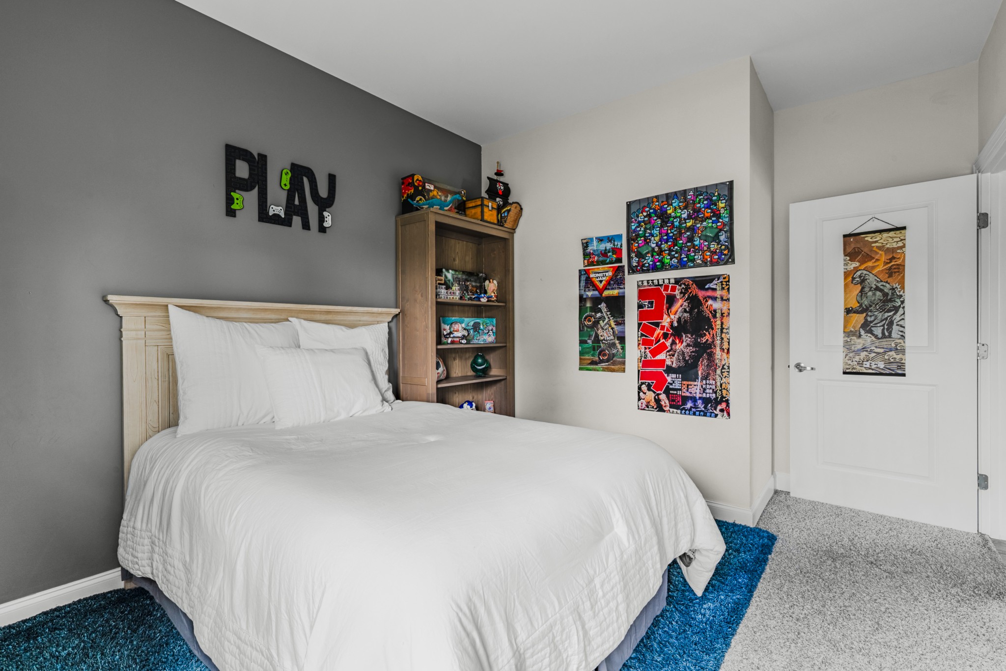 404 Golf Club Lane Springfield, TN 37172 - Photo 29 of 38 a bedroom with a bed and a book shelf