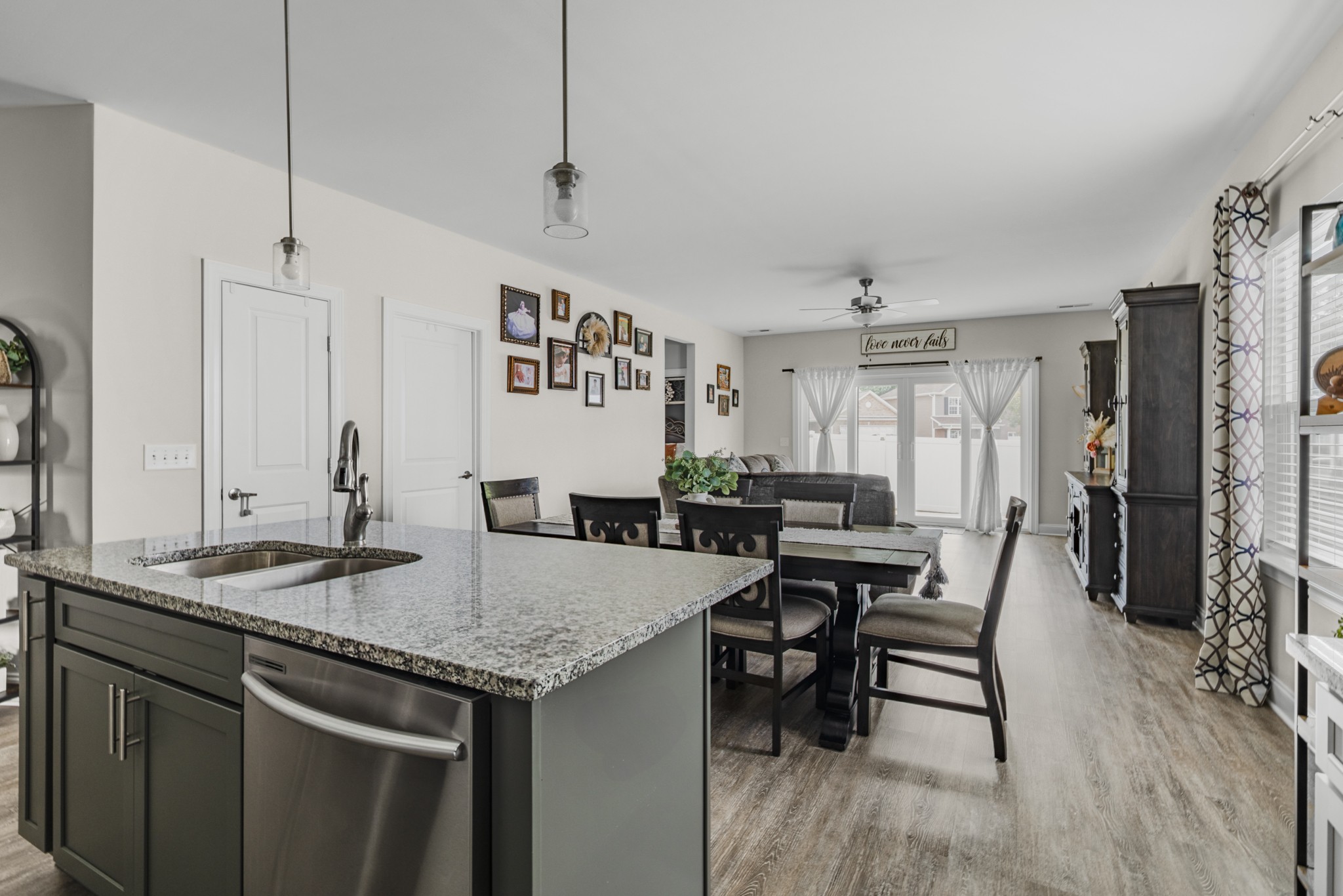 404 Golf Club Lane Springfield, TN 37172 - Photo 8 of 38 a view of a kitchen area with furniture and wooden floor