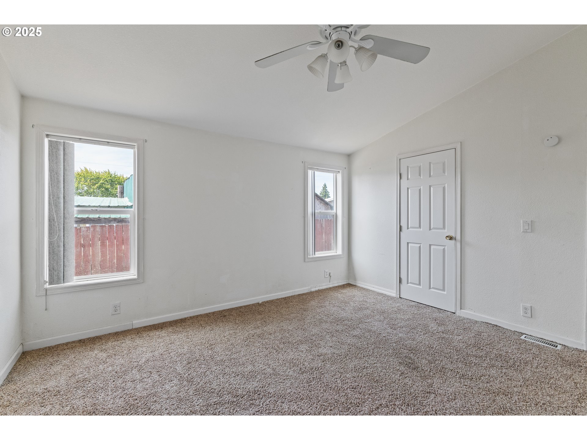 1829 East Willow Street Myrtle Point, OR 97458 - Photo 25 of 37 a view of an empty room with a window