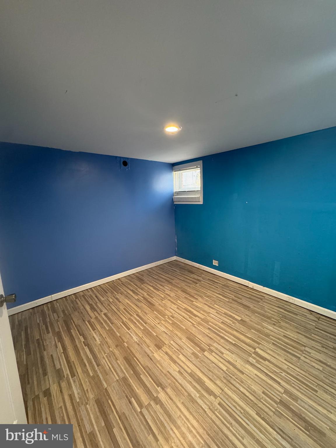 9604 Lanham Severn Road Lanham, MD 20706 - Photo 11 of 30 a view of empty room with wooden floor