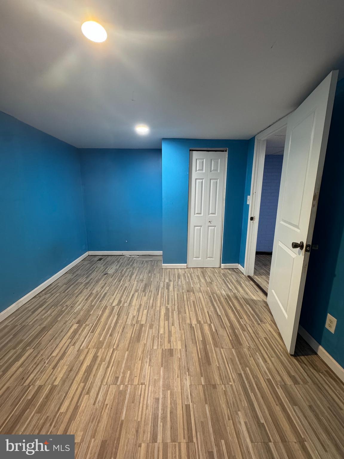 9604 Lanham Severn Road Lanham, MD 20706 - Photo 12 of 30 a view of empty room with wooden floor