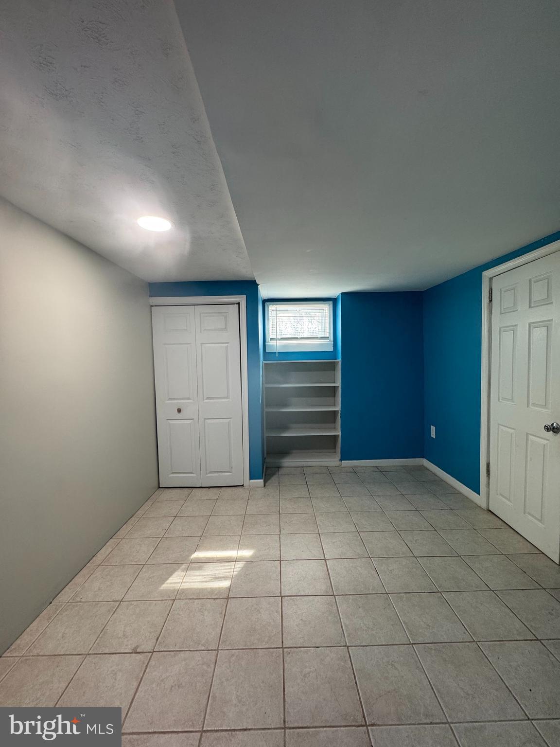 9604 Lanham Severn Road Lanham, MD 20706 - Photo 18 of 30 a view of an empty room with a fireplace