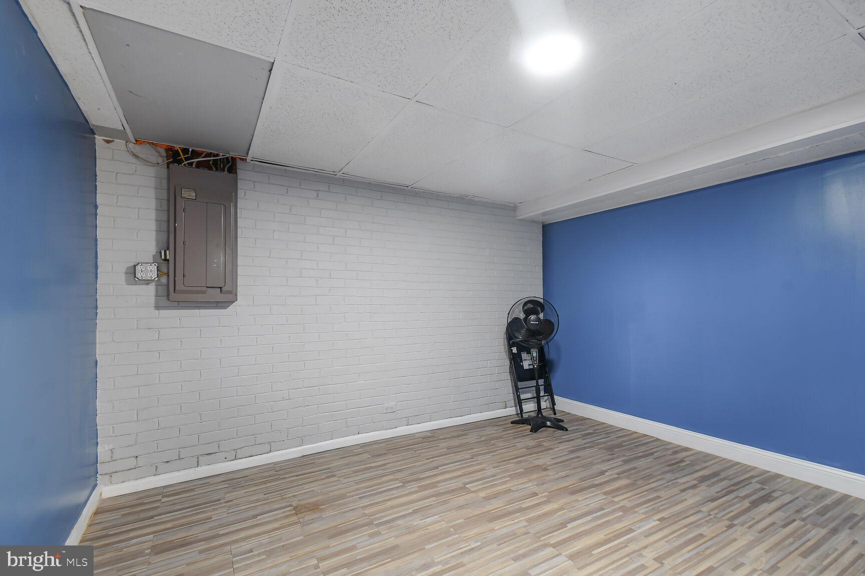 9604 Lanham Severn Road Lanham, MD 20706 - Photo 19 of 30 a view of a livingroom with wooden floor
