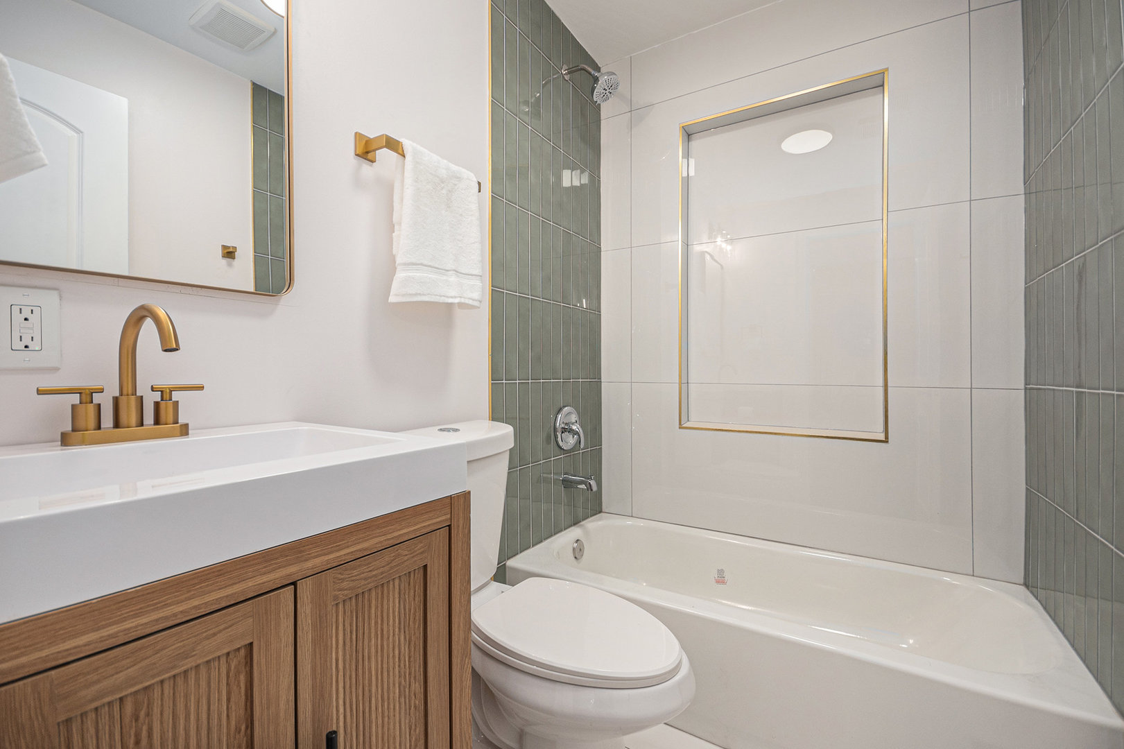 4138 Arthur Avenue Brookfield, IL 60513 - Photo 13 of 25 a bathroom with a sink a toilet and shower
