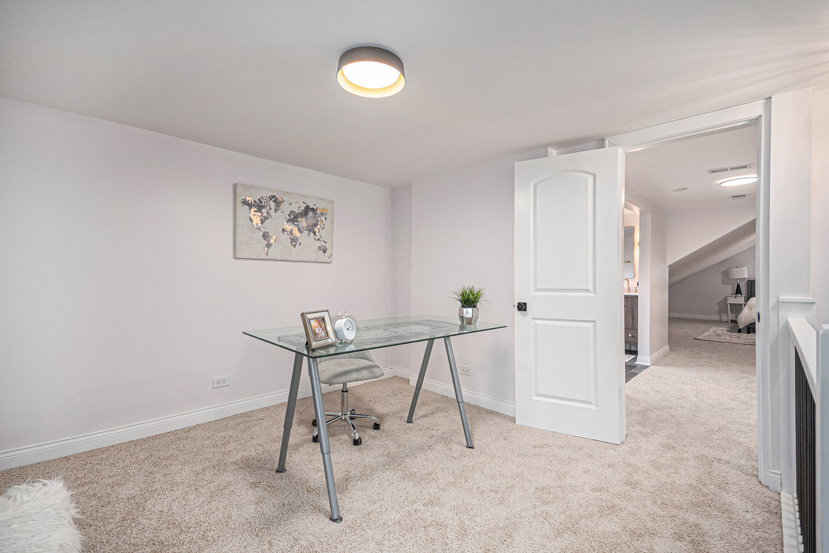 4138 Arthur Avenue Brookfield, IL 60513 - Photo 19 of 25 a view of a hallway with paintings on the wall
