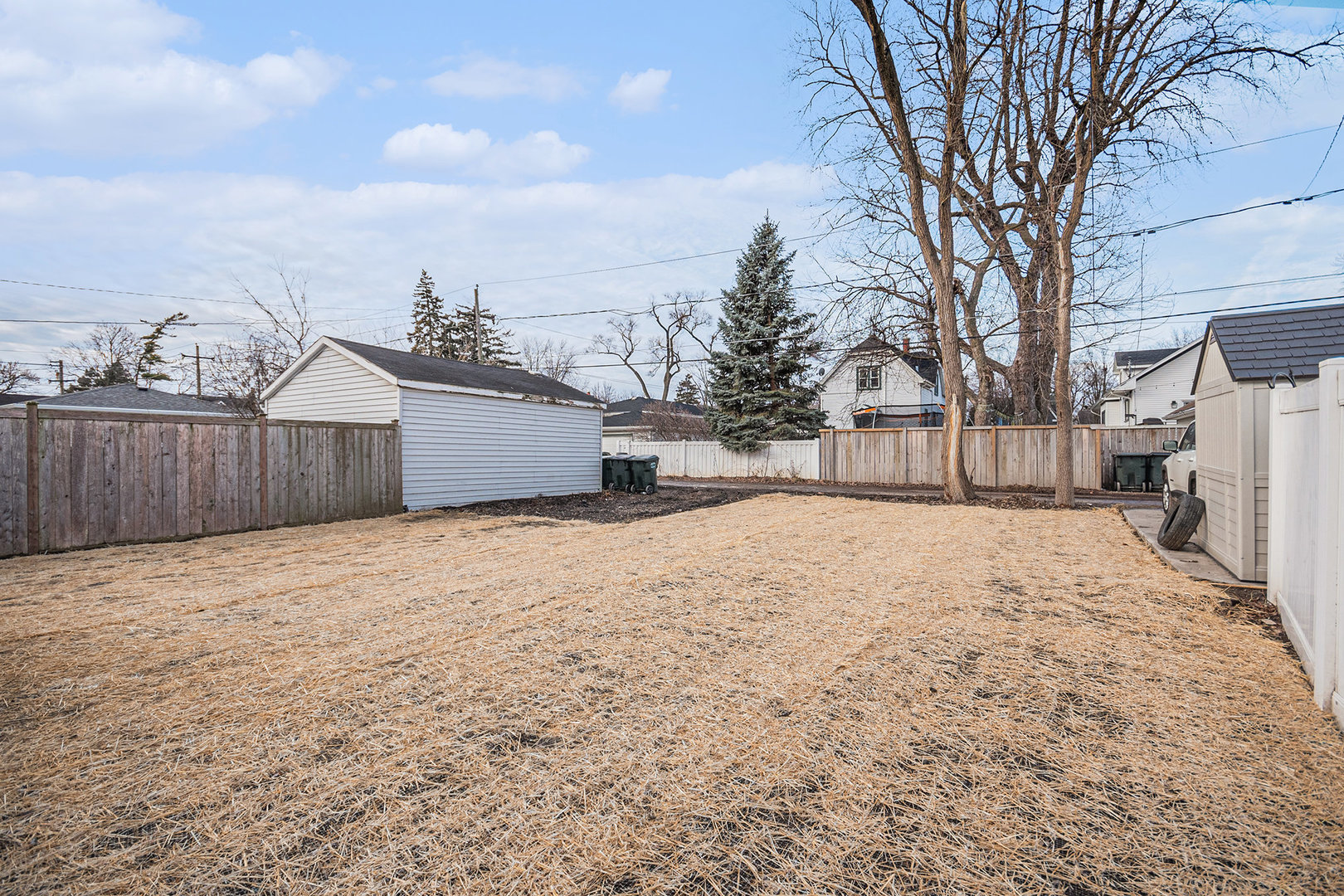 4138 Arthur Avenue Brookfield, IL 60513 - Photo 24 of 25 a street view with wooden fence