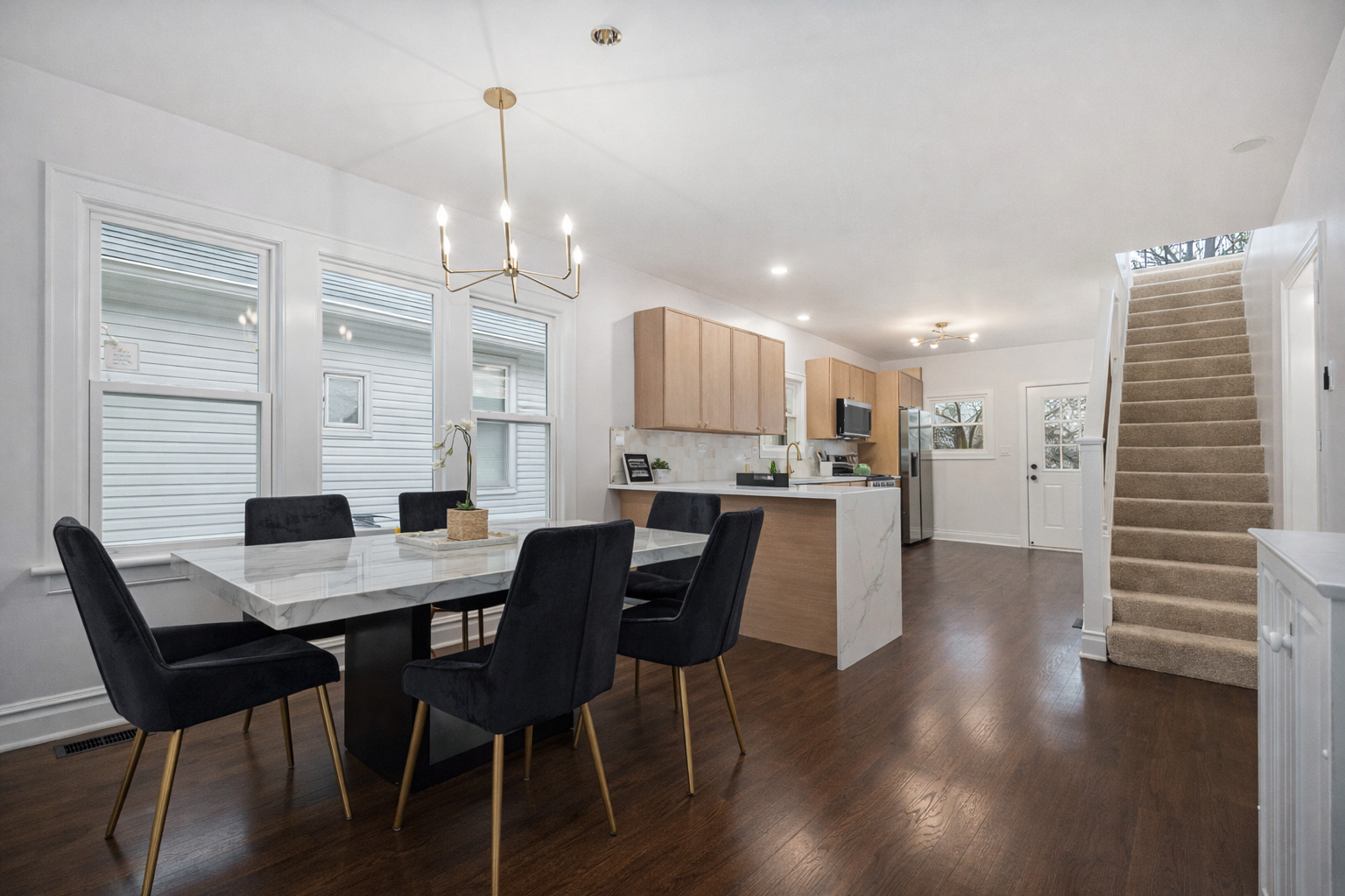 4138 Arthur Avenue Brookfield, IL 60513 - Photo 3 of 25 a view of a dining room with furniture and wooden floor