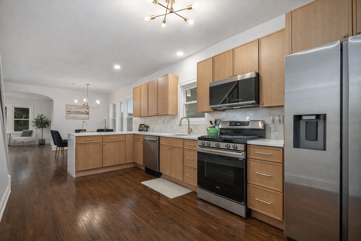 4138 Arthur Avenue Brookfield, IL 60513 - Photo 4 of 25 a kitchen with a refrigerator stove and microwave
