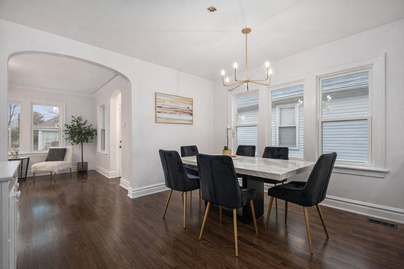 4138 Arthur Avenue Brookfield, IL 60513 - Photo 6 of 25 a view of a dining room with furniture window and wooden floor