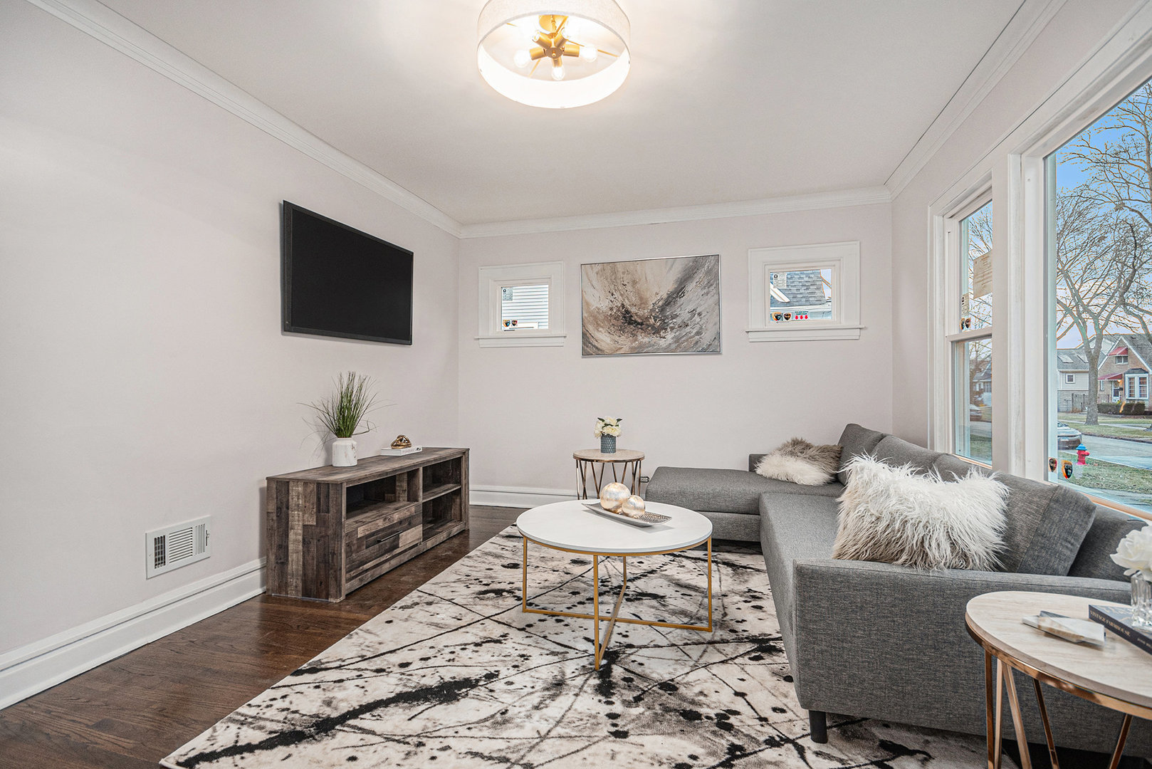 4138 Arthur Avenue Brookfield, IL 60513 - Photo 9 of 25 a living room with furniture and a flat screen tv