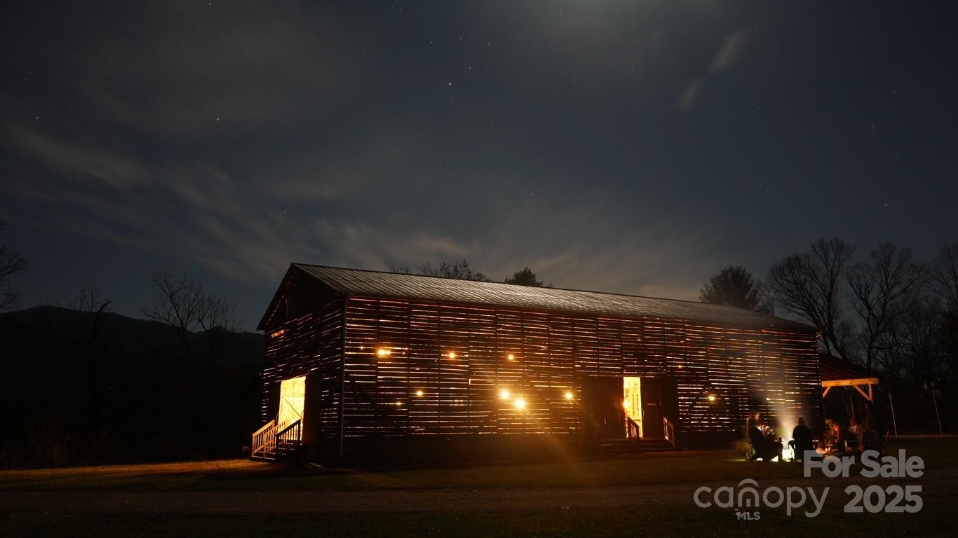 1295 Paint Rock Road Hot Springs, NC 28743 - Photo 18 of 29 a view of fireplace with wooden floor