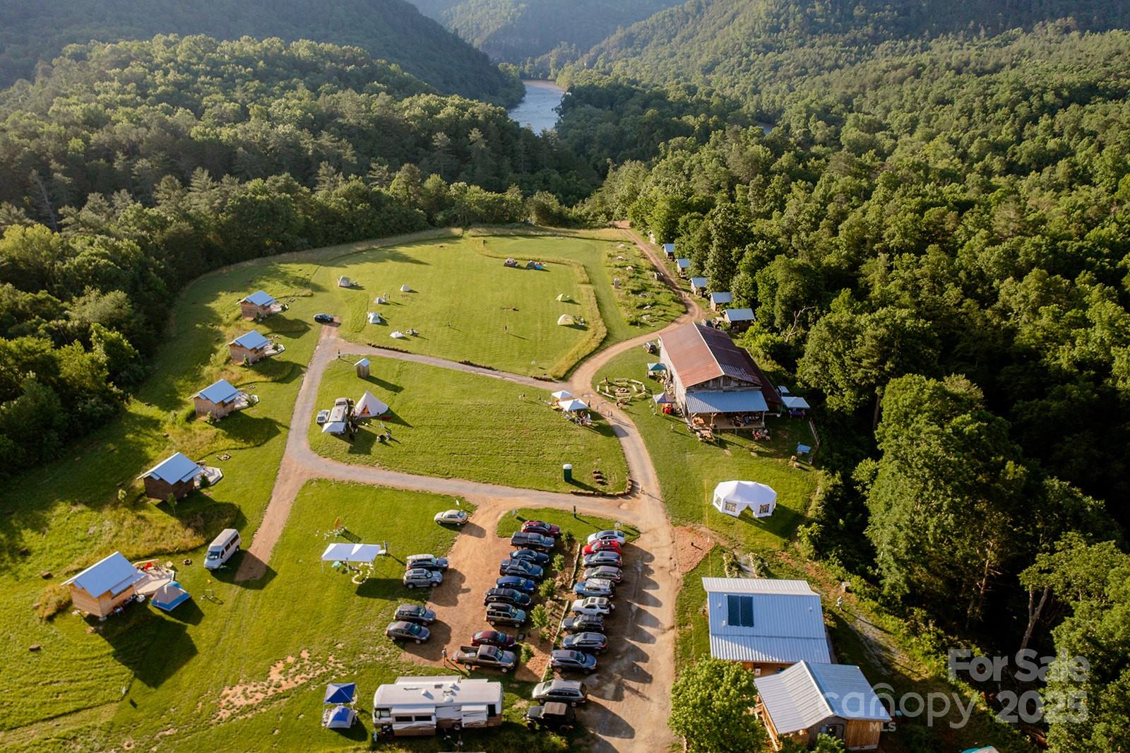 1295 Paint Rock Road Hot Springs, NC 28743 - Photo 2 of 29 an aerial view of a residential houses with outdoor space