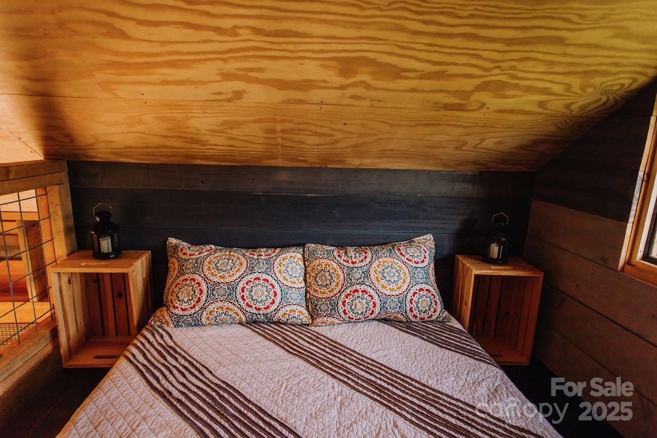 1295 Paint Rock Road Hot Springs, NC 28743 - Photo 10 of 29 a view of a room with shelves