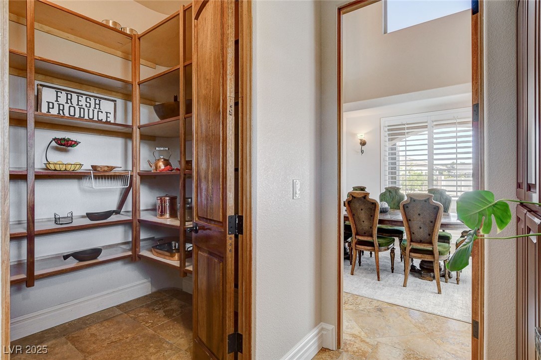 1182 Thomas Bay Circle Logandale, NV 89021 - Photo 30 of 98 View of walk in pantry with door to formal dining area