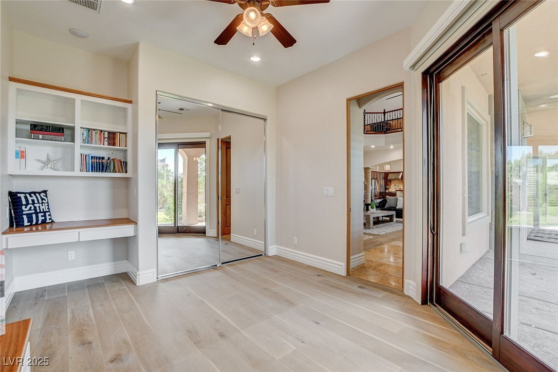 1182 Thomas Bay Circle Logandale, NV 89021 - Photo 40 of 98 Unfurnished office with a ceiling fan, light wood-style floors, recessed lighting, and built in study area