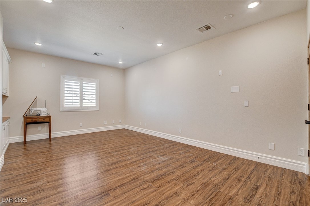 1182 Thomas Bay Circle Logandale, NV 89021 - Photo 58 of 98 Bedroom with wood-like finished floors and recessed lighting