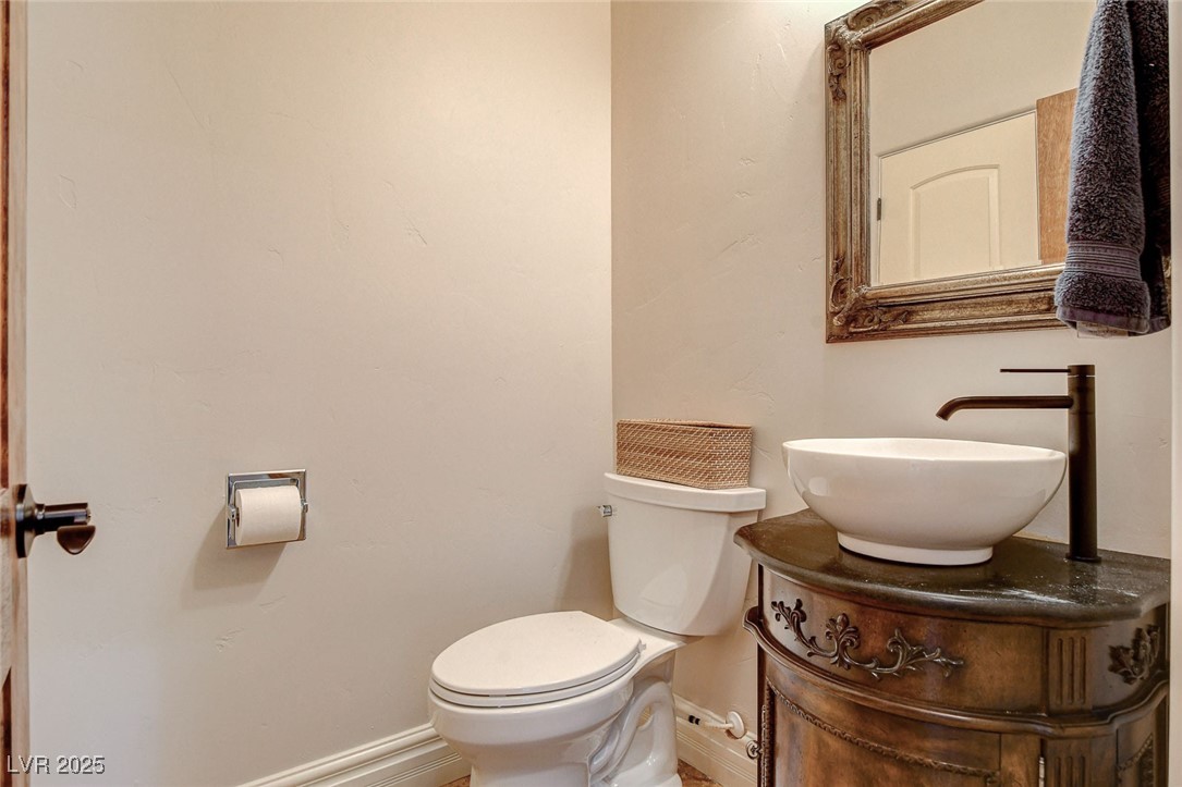1182 Thomas Bay Circle Logandale, NV 89021 - Photo 60 of 98 Bathroom with vanity and toilet for upstairs guests
