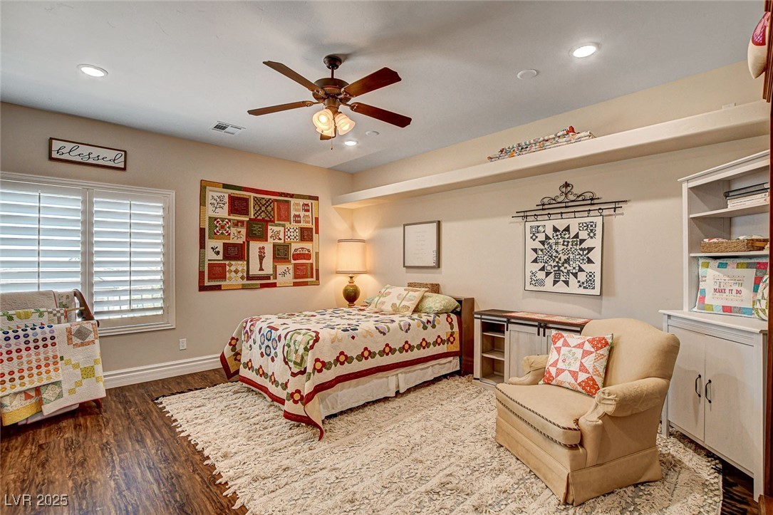 1182 Thomas Bay Circle Logandale, NV 89021 - Photo 75 of 98 Bedroom with wood finished floors, recessed lighting, and ceiling fan