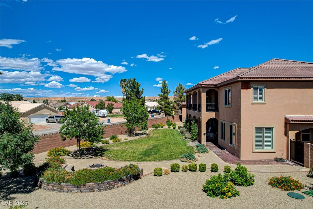 1182 Thomas Bay Circle Logandale, NV 89021 - Photo 93 of 98 View of back of home with view and a patio