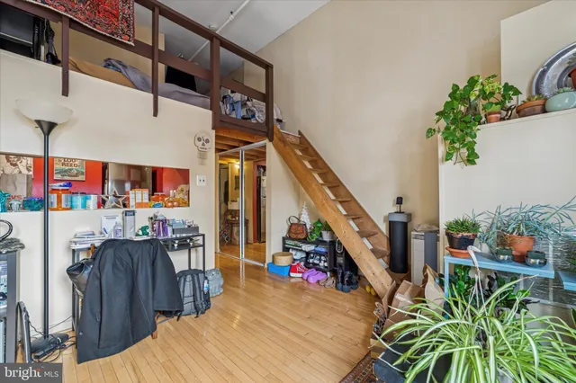 a bed room with a bed and a desk