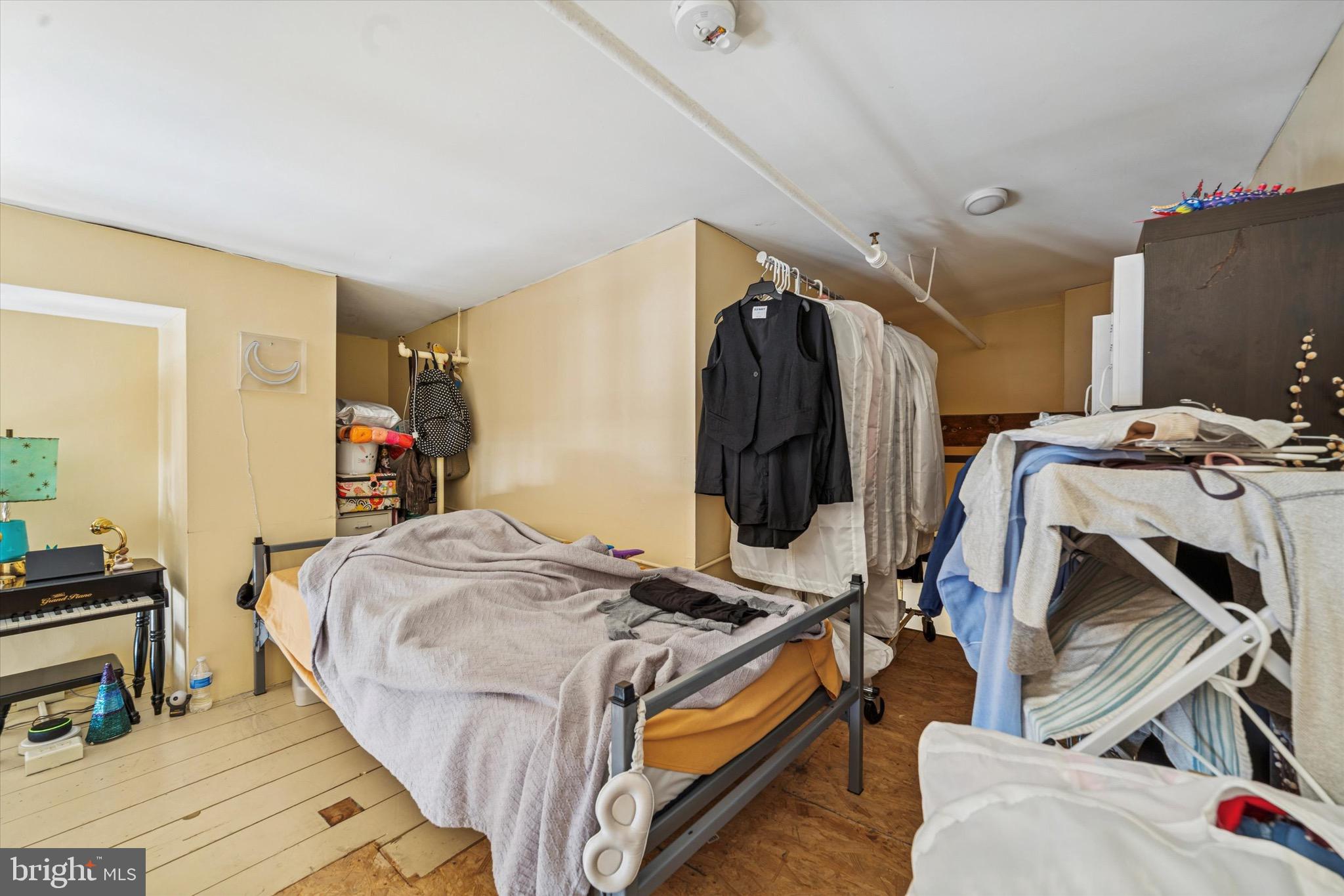 1010 Race Street, Unit PHM Philadelphia, PA 19107 - Photo 12 of 14 a bed room with a bed and a desk