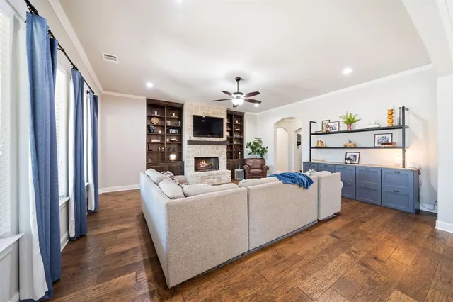 a kitchen with stainless steel appliances granite countertop a stove and a refrigerator