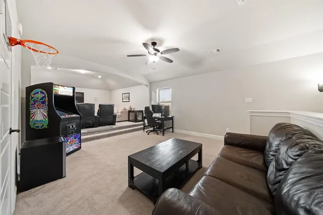 a living room with furniture and a couch