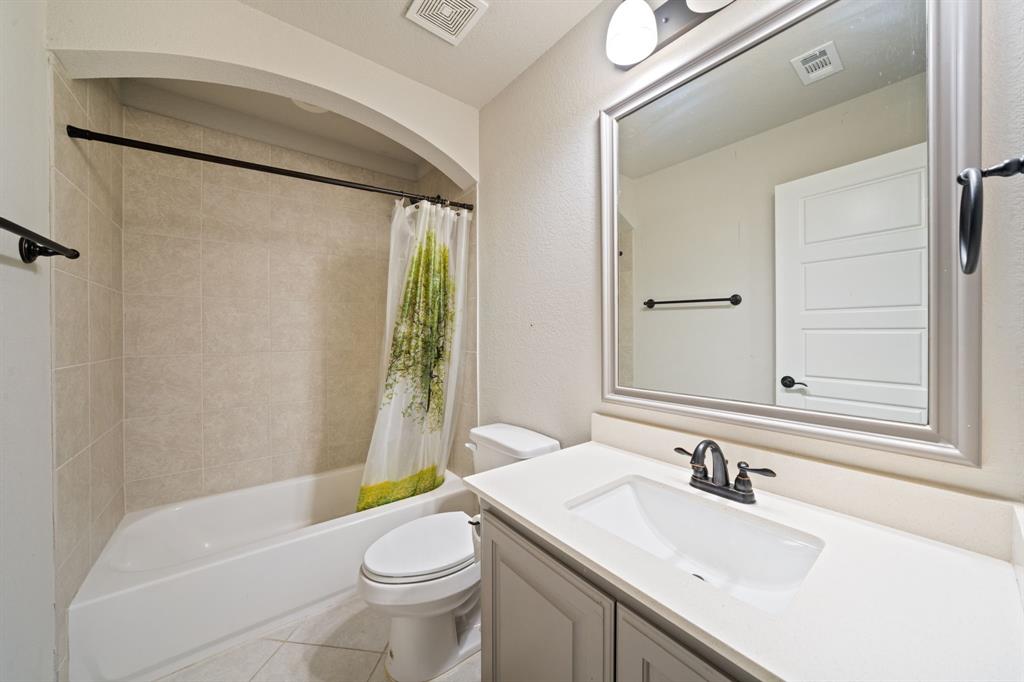 3601 Plainview Road Midlothian, TX 76065 - Photo 36 of 40 a bathroom with a sink toilet and shower