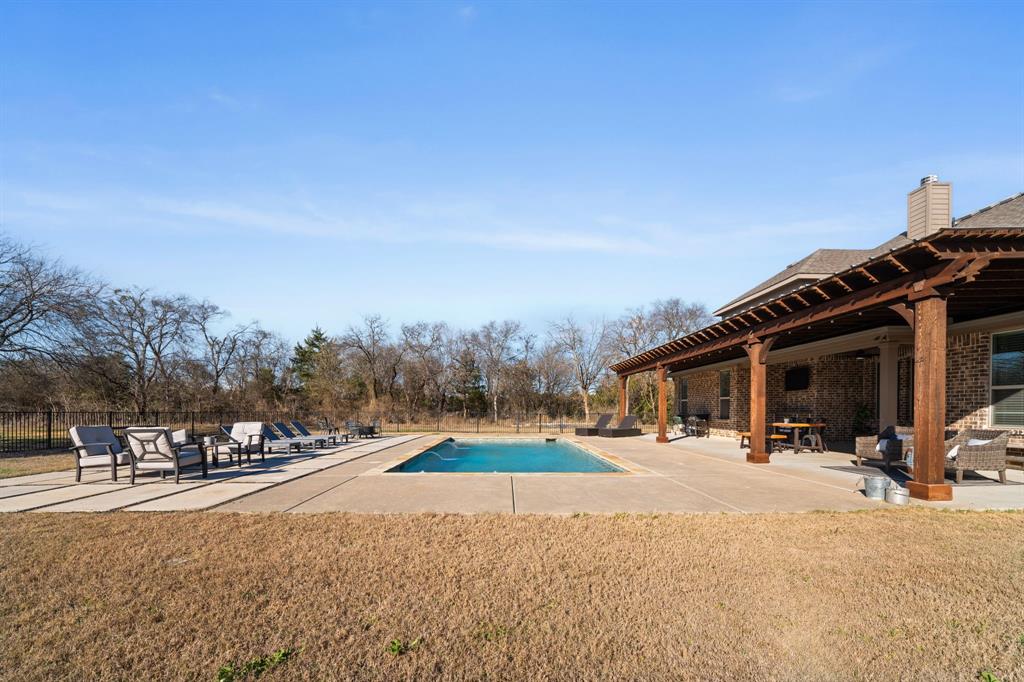 3601 Plainview Road Midlothian, TX 76065 - Photo 8 of 40 a outdoor space with lots of trees in the background