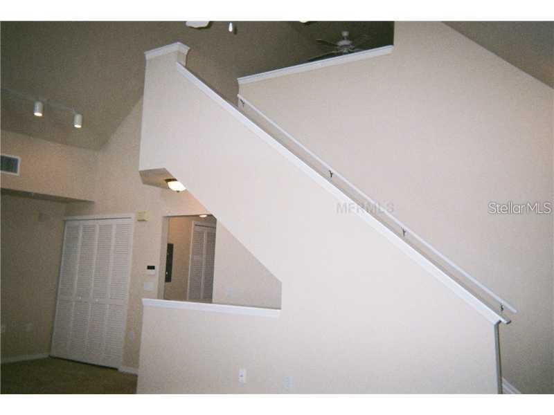 5581 Rosehill Road, Unit 203 Sarasota, FL 34233 - Photo 11 of 17 a view of a living room with windows