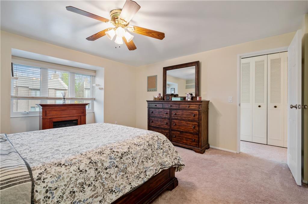 501 Cherry Court Pittsburgh, PA 15237 - Photo 14 of 25 a bedroom with a bed and a dresser