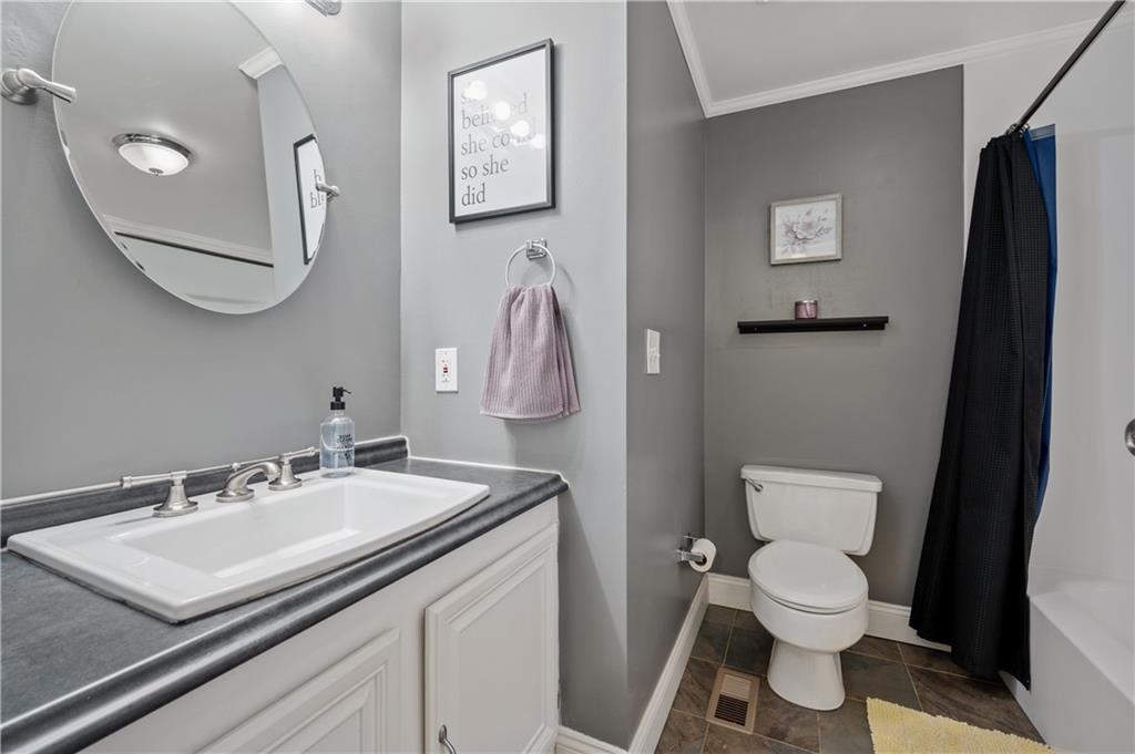501 Cherry Court Pittsburgh, PA 15237 - Photo 18 of 25 a bathroom with a sink toilet and a mirror