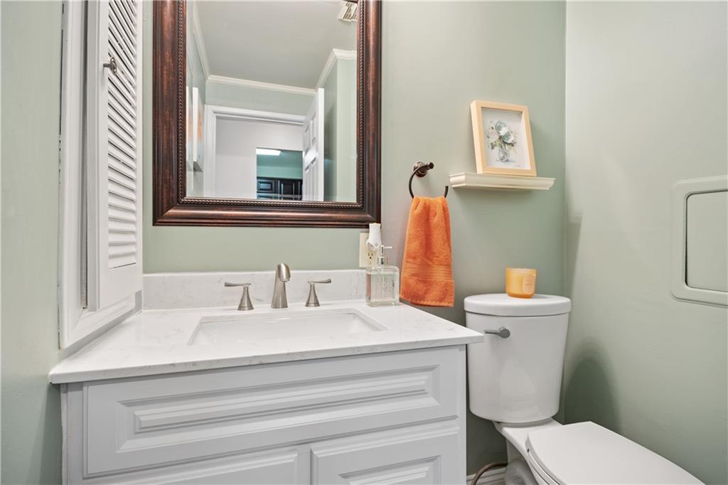 501 Cherry Court Pittsburgh, PA 15237 - Photo 20 of 25 a bathroom with a sink mirror vanity and toilet