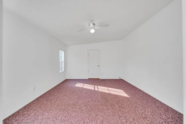 a bathroom with sinks and a mirror