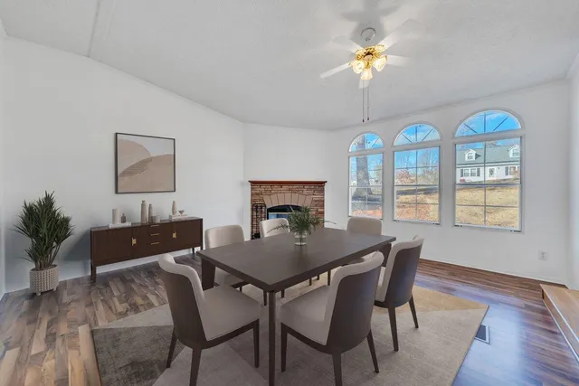 a bedroom with a bed and a fireplace