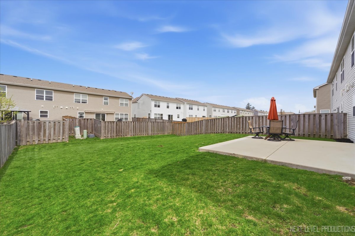 270 Norfolk Lane Pingree Grove, IL 60140 - Photo 23 of 25 a view of a house with backyard and fence