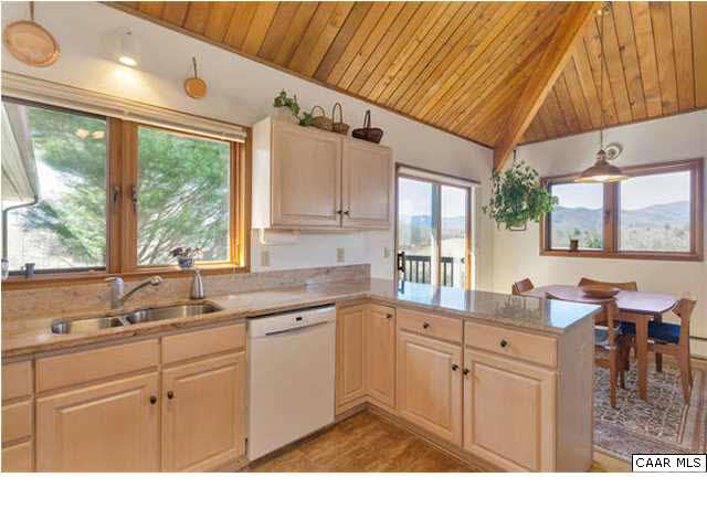 779 Pea Ridge Road Hood, VA 22723 - Photo 13 of 49 Chef's kitchen opens to breakfast room and more mountain vies.