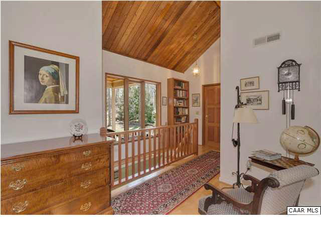 779 Pea Ridge Road Hood, VA 22723 - Photo 8 of 49 Entrance foyer w/ wood floors opens to living room, residential corridor, stairs to terrace level and chef's kitchen